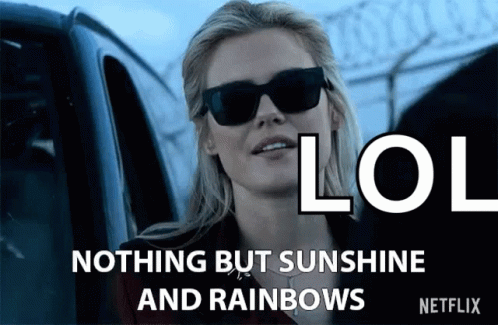 A Woman Wearing Sunglasses Says Nothing But Sunshine And Rainbows On A Netflix Ad . GIF