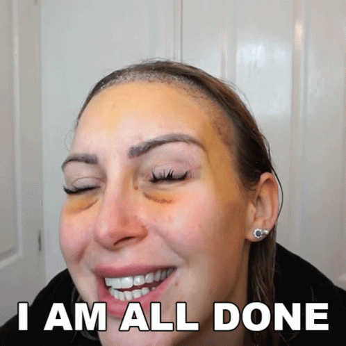 A Woman With A Black Eye Smiles With The Words " I Am All Done " Behind Her GIF