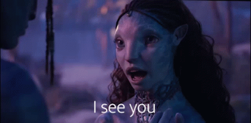 A Woman With A Blue Face Is Talking To A Man With The Words I See You Above Her GIF