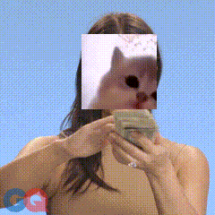 A Woman With A Cat In Front Of Her Face Holding A Cell Phone GIF