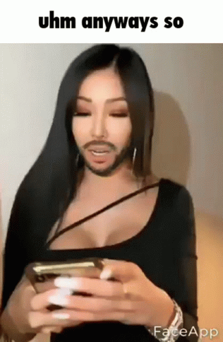 A Woman With A Fake Beard Is Holding A Cell Phone GIF