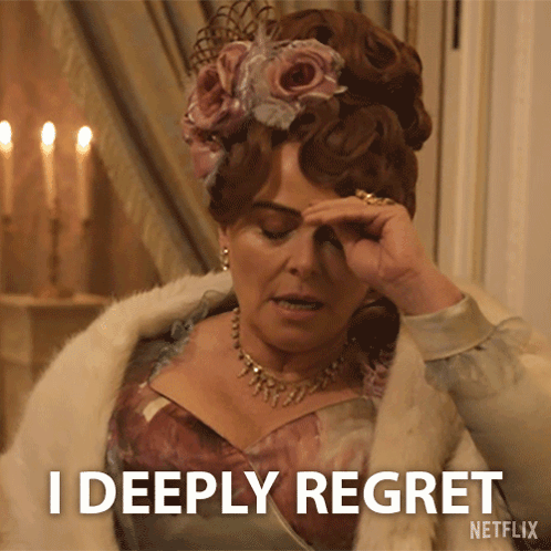 A Woman With A Flower In Her Hair Says I Deeply Regret GIF
