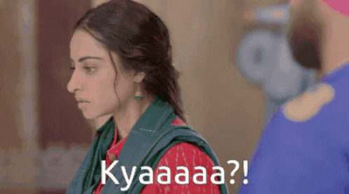 A Woman With A Green Scarf Around Her Neck Says Kyaaaa ? GIF