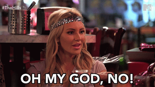 A Woman With A Headband On Her Head Says " Oh My God No " GIF