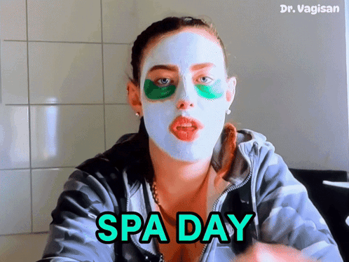 A Woman With A Mask On Her Face And The Words Spa Day GIF