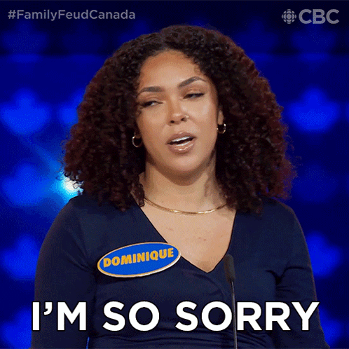 A Woman With A Name Tag That Says Dominique Is Saying " I 'M So Sorry " GIF