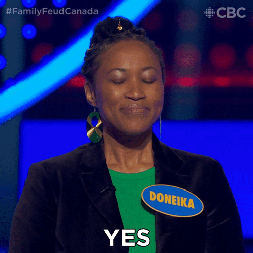 A Woman With A Name Tag That Says Doneika GIF