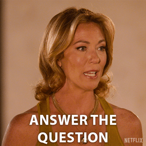 A Woman With A Necklace And A Netflix Logo Behind Her GIF