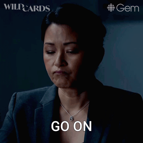 a woman with a necklace says go on