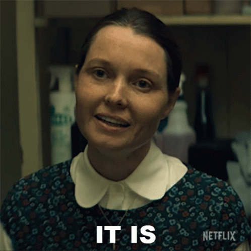 A Woman With A Netflix Logo On Her Sleeve GIF