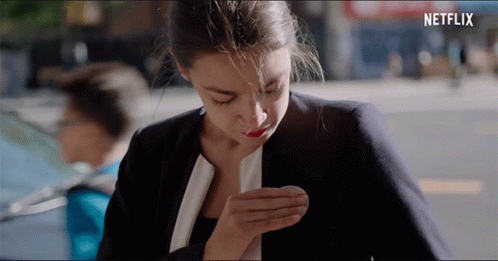 A Woman With A Netflix Logo On The Bottom GIF