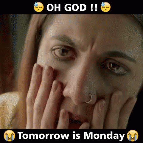 A Woman With A Nose Ring Is Covering Her Face With Her Hands And Crying Because Tomorrow Is Monday . GIF