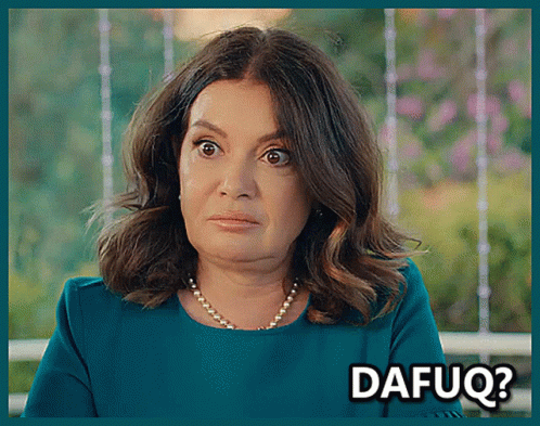 A Woman With A Pearl Necklace Is Making A Funny Face With The Words Dafuq Written Below Her GIF