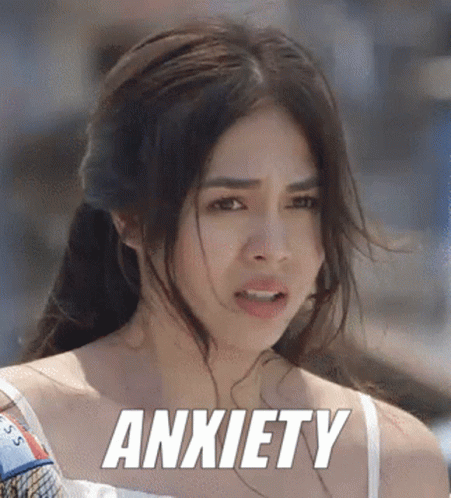 A Woman With A Ponytail And The Word Anxiety Written On Her Face GIF