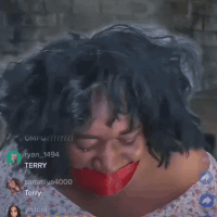A Woman With A Red Ribbon Around Her Mouth GIF