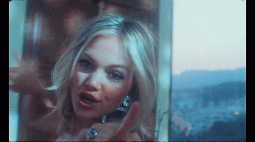 A Woman With A Ring On Her Finger Giving The Middle Finger GIF