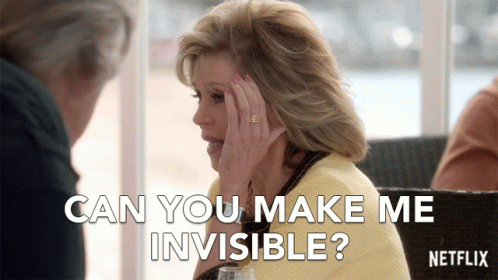 A Woman With A Ring On Her Finger Is Talking To A Man And Says " Can You Make Me Invisible " GIF