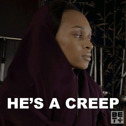 A Woman With A Scarf Around Her Head And The Words He 'S A Creep GIF