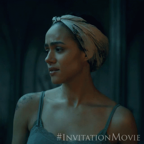 A Woman With A Scarf Around Her Head Is Featured In An Invitation Movie GIF
