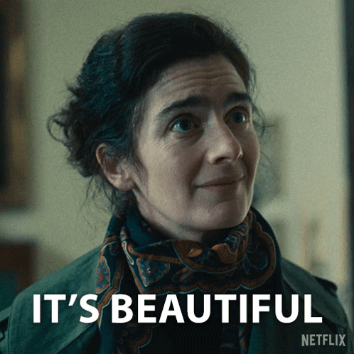 A Woman With A Scarf Around Her Neck Says It 'S Beautiful Netflix GIF