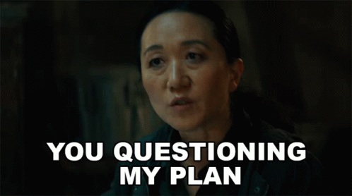 a woman with a serious look on her face is being questioned about her plan