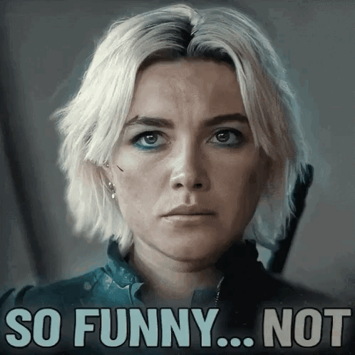 A Woman With A Serious Look On Her Face With The Words So Funny Not Written Below Her GIF