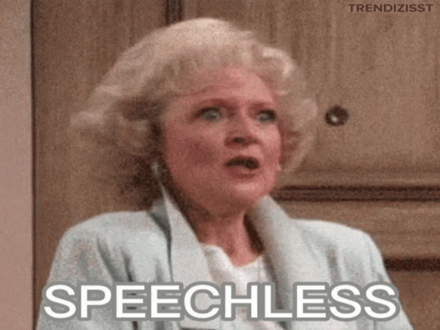 A Woman With A Surprised Look On Her Face And The Word Speechless Below Her GIF