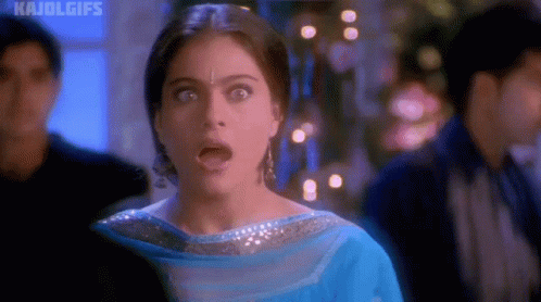 A Woman With A Surprised Look On Her Face And The Words Kajolgifs On The Bottom Right GIF