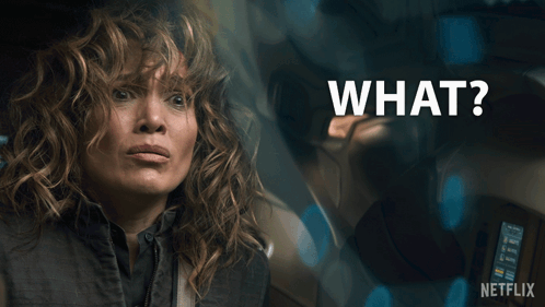 Surprised Woman With Words What Above Her GIF