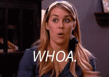 A Woman With A Surprised Look On Her Face And The Words Whoa Written On Her Face . GIF