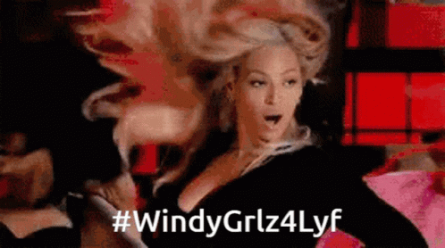 A Woman With A Surprised Look On Her Face And The Words Windy Grlz4lyf GIF