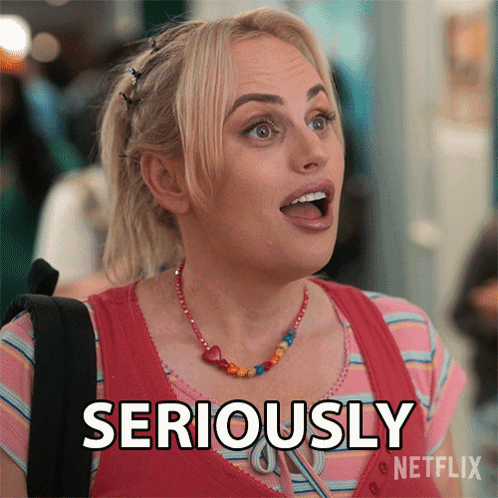 A Woman With A Surprised Look On Her Face Is Making A Seriously Sign GIF