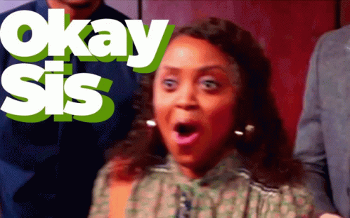 A Woman With A Surprised Look On Her Face Is Standing In Front Of Okay Sis GIF