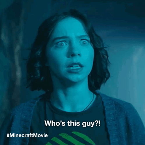 A Woman With A Surprised Look On Her Face Is Wearing A Minecraft Movie Shirt GIF
