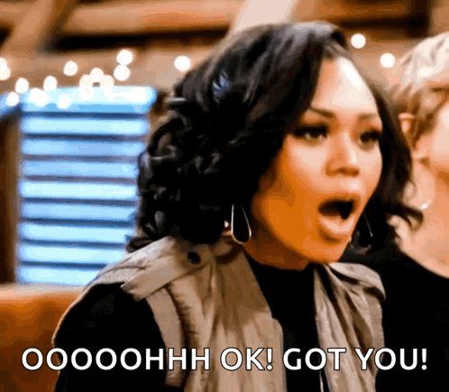 A Woman With A Surprised Look On Her Face Says " Oooohhhh Ok ! Got You " GIF