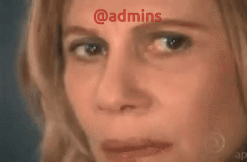 A Woman With A Triangle On Her Face And The Words @Admins Above Her GIF