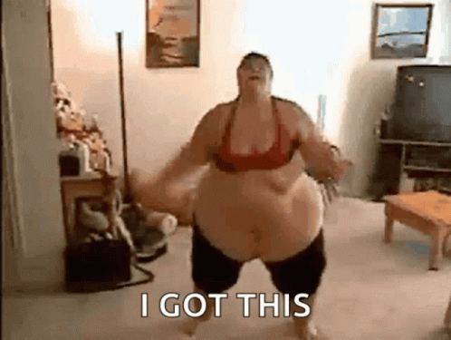 A Woman With A Very Large Belly Is Dancing In A Living Room And Says I Got This . GIF