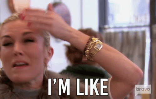 A Woman With A Watch On Her Wrist Is Making A Face And Says I 'M Like GIF