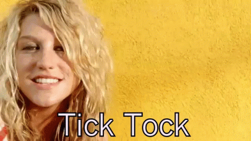 A Woman With A Yellow Background And The Words Tick Tock On It GIF