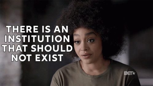 A Woman With An Afro Says There Is An Institution That Should Not Exist .. GIF