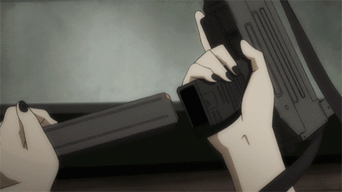 A Woman With Black Nails Is Holding A Gun With The Number 7 On Her Wrist GIF