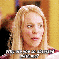 A Woman With Blonde Hair Is Asking Why Are You So Obsessed With Me ? GIF