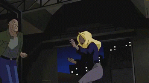 A Woman With Blonde Hair Is Being Held By A Man GIF