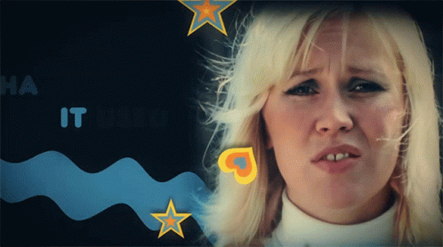 A Woman With Blonde Hair Is Looking At The Camera With The Words Ha It Need Behind Her GIF