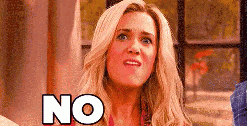 A Woman With Blonde Hair Is Making A Funny Face And Saying No . GIF