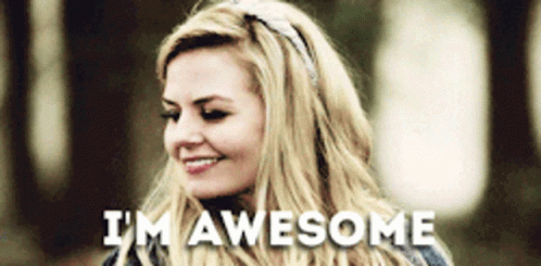 A Woman With Blonde Hair Is Smiling With The Words I 'M Awesome Below Her GIF