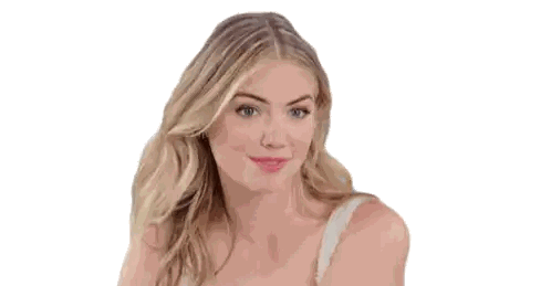 a woman with blonde hair is wearing a white bra and making a funny face