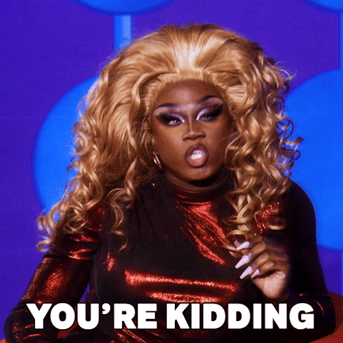 A Woman With Blonde Hair Says You 'Re Kidding On A Purple Background GIF