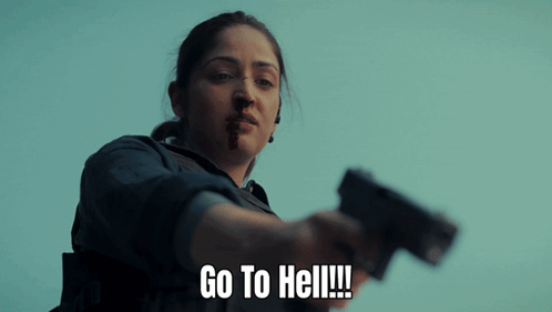 A Woman With Blood On Her Face Is Holding A Gun And Says Go To Hell !!! GIF