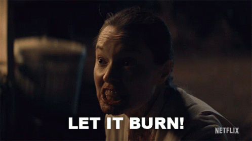 A Woman With Blood On Her Face Says Let It Burn In A Netflix Ad GIF